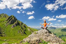 You may ask yourself what's the big deal about standing and how. Young Woman Sitting In Yoga Pose In Mountains Stock Photo Picture And Royalty Free Image Image 33096565