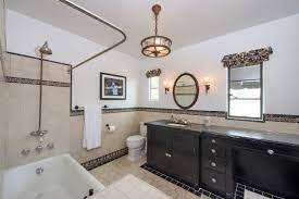 A prismatic chandelier contributes flashes of sparkle. Vintage Bathroom Design Houzz