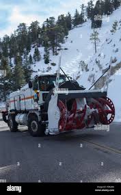 Cal Trans rotary snowplow blower on the Angeles Crest Highway in the Angeles  National forest Southern California Stock Photo - Alamy