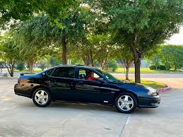 Image result for Black 2005 Impala
