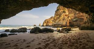 Known for its golden beaches and turquoise seas, the algarve in portugal, is a popular destination for europeans seeking a relaxing beach holiday. Algarve Beaches Beach Bums And Secret Caves Adventure Family Travel Wandering Wagars