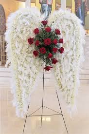 Angelic And Majestic These Unique Wings Are The Perfect Way To Send Your Loved One Off In 2020 Funeral Floral Arrangements Funeral Flower Arrangements Funeral Flowers