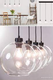 glas hoeft niet saai te zijn dat bewijst deze moderne 4 lichts hanglamp de glazen bollen hebben een moderne uitstralin hanglamp plafondverlichting glazen bol