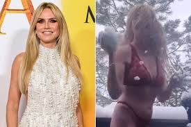 Heidi Klum Frolics in the Snow in Red Lacy Lingerie in Cheeky Video