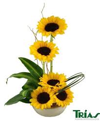 Party supply & rental shop in miami, florida. Sunflower Delight Sunflower Floral Arrangements Tropical Floral Arrangements Sunflower Arrangements