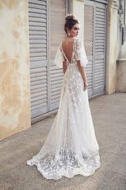 You'll be dancing the night away in this comfortable polyester and spandex blend. 3d Floral Embroidered V Neck A Line Wedding Dress With Draped Sleeves By Anna Campbell Image 2 Boho Wedding Dress Lace Wedding Dresses Backless Wedding