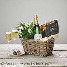 The flowers and champagne arrived on time and as beautiful as the picture. Luxury Champagne Gift Basket