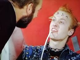 Mr Bastard: Aha! So you do have a...You little RUNT! The ole trick eh, eat  the telly before I get a chance to nick ya. Vyvyan: It's a toaster. Mr  Bastard: It's