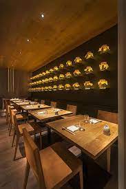 Into Lighting Designlsm Claudio Silvestrin Architects Create A Modern Japanese Urban Dining Environment Japanese Restaurant Interior Japanese Restaurant Design Restaurant Interior