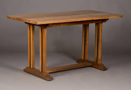 Bargain john's antiques carries a wide variety of quality american antique items dating from the 1850 to 1930 time period. An Arts And Crafts Style Walnut Rectangular Kitchen Table In The Manner Of Heals Raised On Coupled
