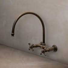 A kitchen faucet has the strength to make or break the look of your kitchen. Sonoma Forge Brownstone Wall Mount Kitchen Faucet With Large Swivel Spout Best Pricing Free Shipping