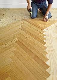 It's now easier than ever to install new flooring yourself, thanks in part to plastics. How To Install A Herringbone Floor Diy Wood Floors Herringbone Floor Diy Flooring