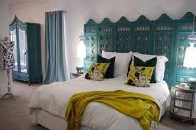 Reclaimed wood headboard rustic headboards distressed headboard wood pallet headboards headboards for beds diy driftwood headboard blue the bed defines the bedroom and the headboard defines the bed. Headboard Turquoise Room Divider Headboard Eclectic Bedroom Bedroom Design