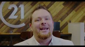 Will Hutson, The Hutson Group has its first closing at the Woodstock office  with Terry Swanson