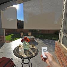 This is a great way to enjoy your porch or patio without the sun's glare. Keystone Fabrics Premier Motorized Outdoor Solar Shade With Protective Valance Exterior Solar Shade Outdoor Sun Shade Solar Shades