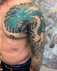 The artist beautifully played with red, gray, black, and yellow to create an authentic oriental look. Updated 40 Powerful Japanese Dragon Tattoos December 2020