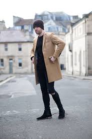 It won't ever go out of style, so you'll definitely wear it. Noose Monkey Camel Overcoat And Black Ripped Skinny Jeans Outfit Your Average Guy