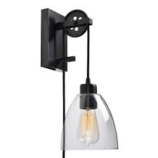 Wall sconces might look decorative, but they still serve a familiar purpose as a light, which means you'll find sconces with some useful designs and features. Black Metal Accordion Adjustable Wall Sconce By World Market Shefinds
