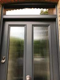 Decorpattern™ narrow reeded decorative textured glass for spaces which require light and privacy whether it be at home or in the office, some spaces crave natural light yet still demand a level of privacy and style. The Black Victorian Door With Reeded Glass Panels And Sandblasted House Number Above Victorian Front Doors Victorian Homes Exterior Single Exterior Doors