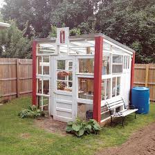 The door option is nice for easy maintenance, and for temperature control when it starts to warm up. Build A Greenhouse From Old Recycled Windows Diy Mother Earth News