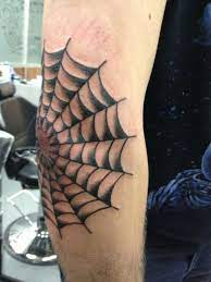 Feelings of entrapment or a feeling of being somewhere you don't feel is the ultimate place for you can be symbolized by a spider web tattoo. The Symbolism Of The Cobweb Is The Association With Spiders Trapping Prey And Criminals Being Trapped Behind Bars Th Prison Tattoos Gang Tattoos Elbow Tattoos