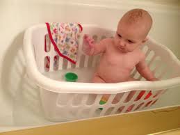 When you give a sponge bath (also known as topping and tailing), you just clean your baby without putting her in water. Use A Laundry Basket As A Nonslip Baby Bath Baby Bath Parenting Hacks Baby Life