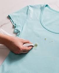 Place the stained article of clothing on a flat surface and apply several drops of natural dish soap to the stained areas. How To Get Oil Stains Out Of Clothes Step By Step With Pictures Apartment Therapy