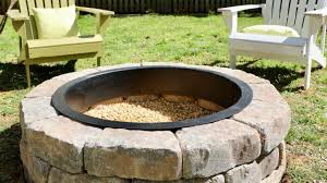Upcycle an old tractor wheel into a cool fire pit. How To Build A Diy Fire Pit In Your Backyard Thrift Diving Youtube