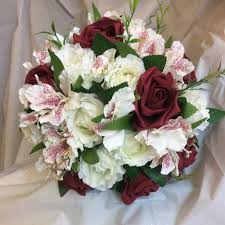 Maybe you would like to learn more about one of these? Last One A Wedding Bouquet Of Artificial Silk And Foam Burgundy Ivory Roses Artificial Wedding Bouquets Wedding Bouquets Silk Bridal Flowers