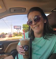 Enjoying iced german chocolate coffee at 7 brew