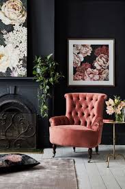Coral Chair With Dark Interiors Trending Decor Home Decor Trends Easy Home Decor