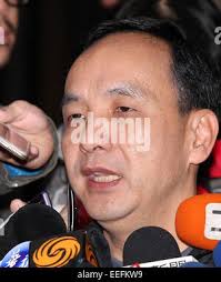 Eric Chu (R), chairman of Taiwan's ruling Nationalist (Kuomintang) party,  attends the opening ceremony of the 10th Cross-Strait Economic, Trade and  Culture Forum in Shanghai