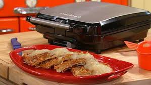 In a medium bowl mix together potatoes, oil, garlic, salt, pepper, and eggs. Crispy Hash Brown Waffles Rachael Ray Show