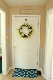 Peek inside my home to see natural gray, burnished clay, rhino, and more on my walls! Entryway Before And After Beige To Greige With Behr Paint The Frugal Homemaker