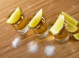 Bartender pours it and immediately the guy drinks. Three Shots Of Tequila With Lime And Salt Stock Photo Picture And Royalty Free Image Image 14161213