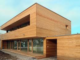 Einfamilienhaus Modern Holzhaus Flachdach Holzfassade Holzterrasse Bauhausstil Modern Fenster Balkon Garage Mit Modernes Holzhaus Moderne Architektur Holzhaus