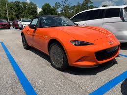 Image result for Hailey Orange 1965 Mazda