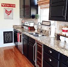 Protect your floor with cardboard or drop cloths. 10 Painted Kitchen Cabinet Ideas