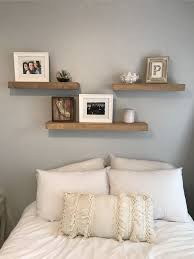 3 Shelves Above Bed White And Grey Bedroom Fun Room Makeover Bedroom Wall Decor Above Bed Above Bed Decor Floating Shelves Bedroom And thanks to that great tutorial, i was able to figure out my shelf measurements much more easily! bedroom wall decor above bed