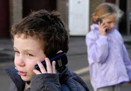 This Is Shot Of Two Kids On Their Individual Cell Phones Artifact They Brought These Phones With Them When They Play Therapist Kids Cell Phone What Is Cell