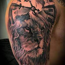 15 Best Lion And Clock Tattoo Designs Petpress Clock Tattoo Designs Clock Tattoo Design Clock Tattoo