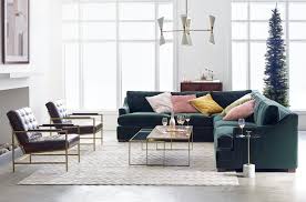 I saw brass studs as sofa accents, side chairs constructed with straight lines rather than curves, and oversized geometric print accent pillows. This Mitchell Gold Bob Williams Sale Has Everything You Need To Nest Into The Holiday Season Dwell