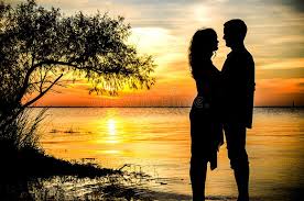 Silhouette of couple in love kissing in sunset. Silhouette Loving Young Couple Hugging Sunset Outside Photos Free Royalty Free Stock Photos From Dreamstime