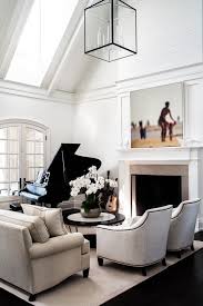 Modern piano room decor, description: Modern Black And White Living Room With Geometric Pendant Light Large Artwork And Piano Grand Piano Living Room Piano Living Rooms White Living Room Decor