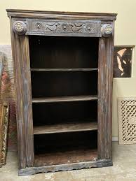 This can also be used for storage. Rustic Blue Bookcase Cowrie Shells Vintage Tall Bookshelf Carved Wood Book Shelf Boho Farmhouse Interior Design