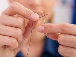 A small hook will come through the needle eye from the back. Easy Hack For Threading A Needle