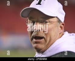 Trinity coach Bob Beatty yells to his team along the sidelines as they  dismantle Simon Kenton in the Kentucky High School Athletic Association  Class 6A football state finals in Louisville, Ky., Saturday,