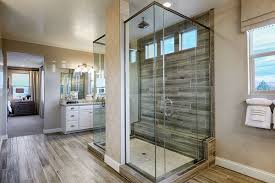 Glass Enclosed Double Sided Walk In Shower With Wood Look Tile Worth Every Hyphen Sage Model Master Bathroom Shower Bathroom Shower Doors Master Bathroom