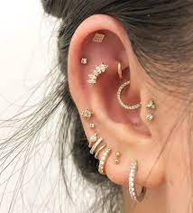 curated ears and more of the biggest piercing trends for 2020 pretty ear piercings cool ear piercings earings piercings