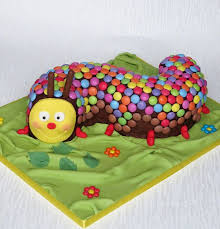 Check out this fun very hungry caterpillar birthday party, especially the birthday cake! Caterpillar Cake Bright Version Of Asda Caterpillar Cake With Extra Smarties Pam Bakes Cakes Pambake Caterpillar Cake Childrens Birthday Cakes Giraffe Cakes